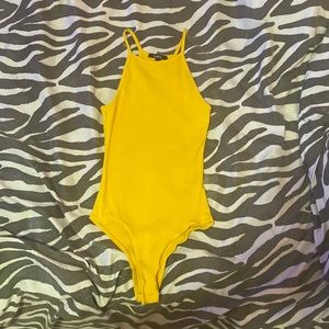 Yellow body suit